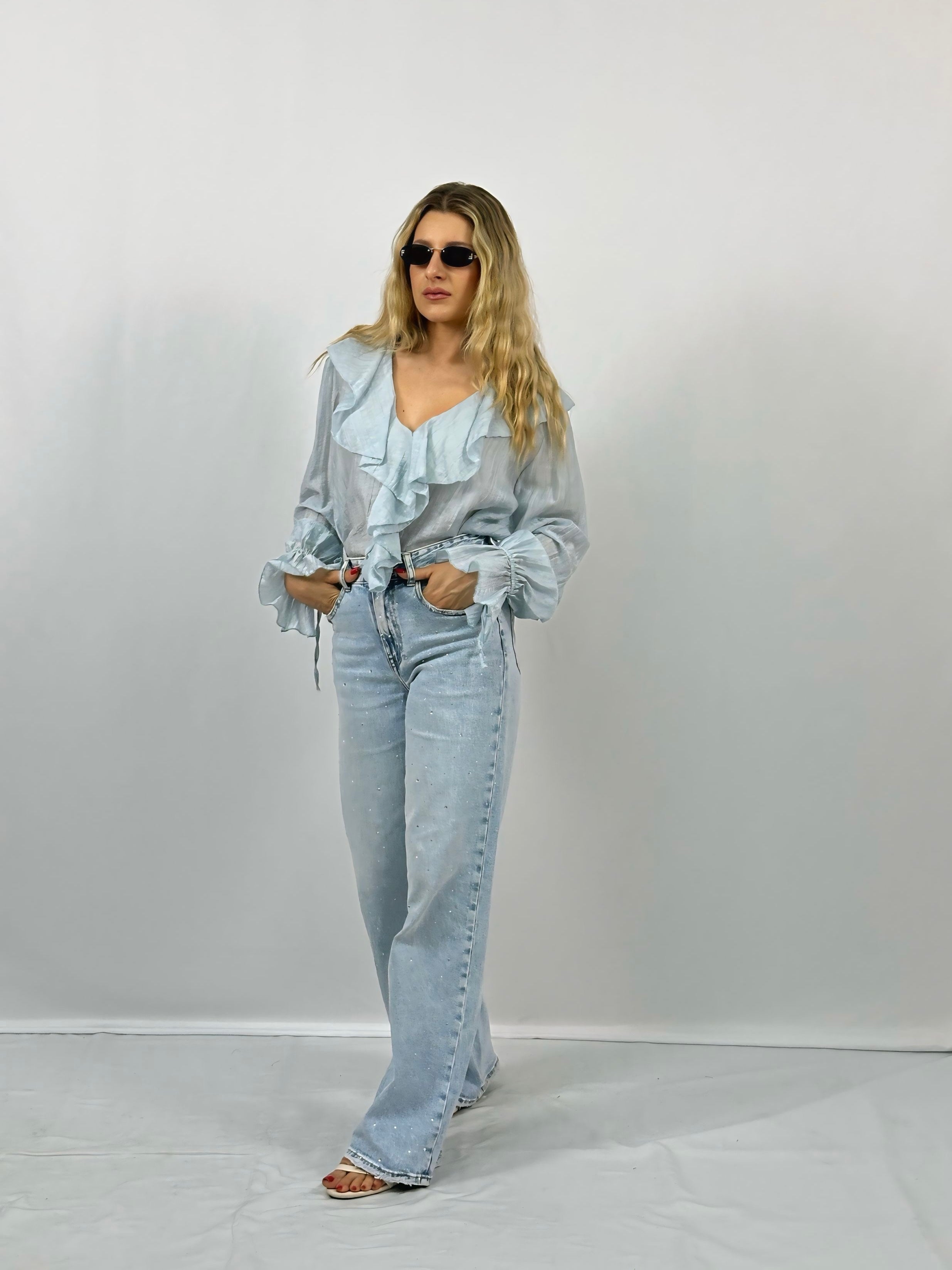 BLUSA CON VOLANT